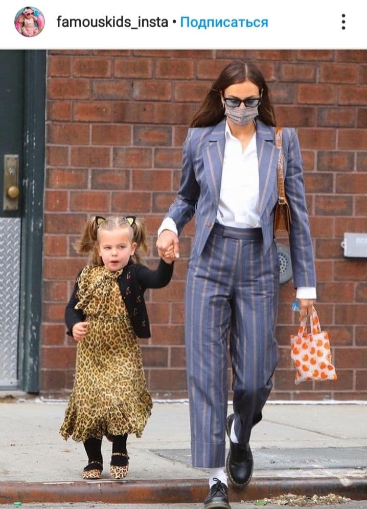 Костюм в смужку і модні черевики: стильна Ірина Шейк вийшла на прогулянку з дочкою Леєю